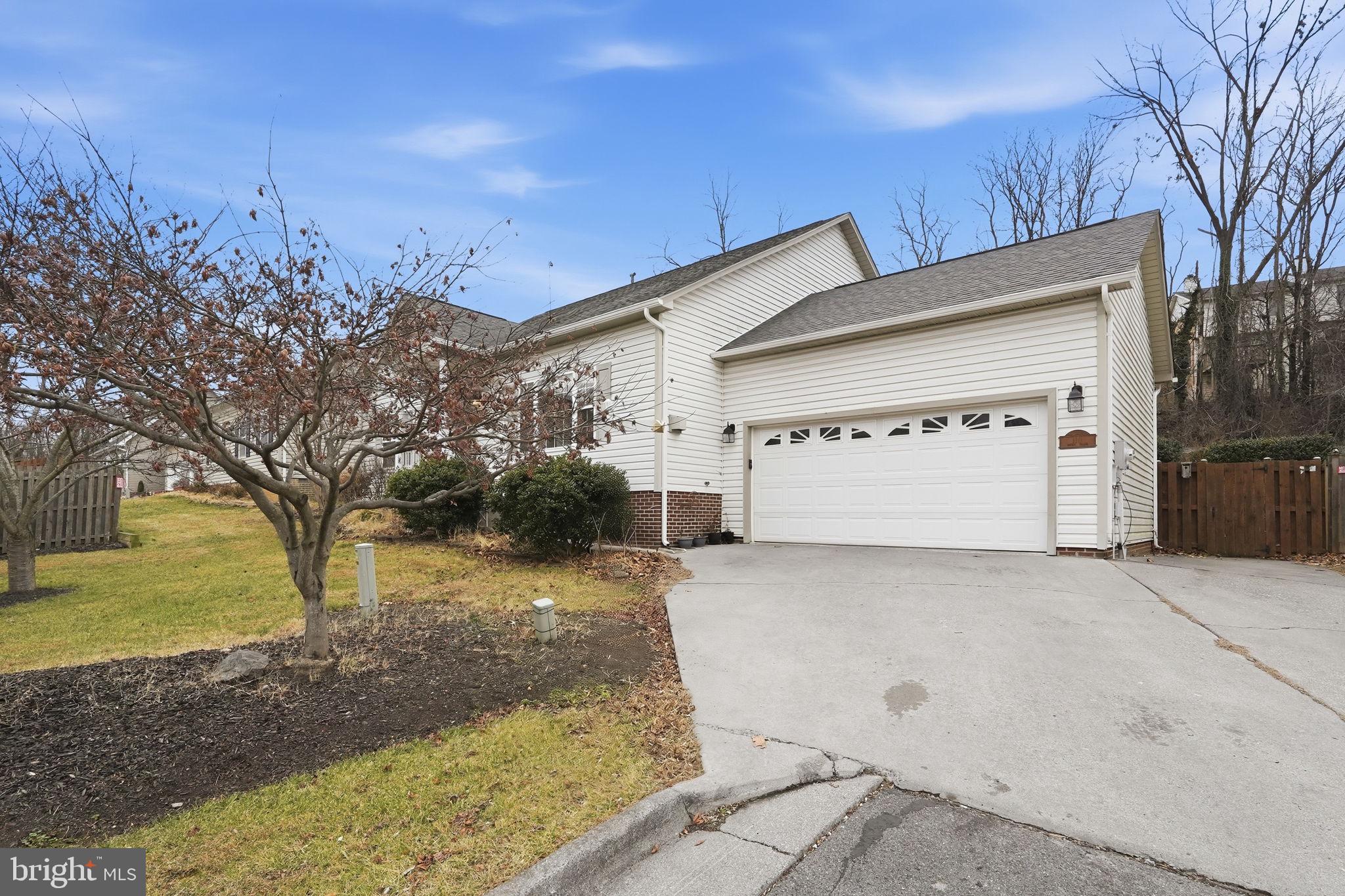 110 Rugby Place Winchester, VA 22603 - Photo 2 of 41 a view of a house with backyard and trees