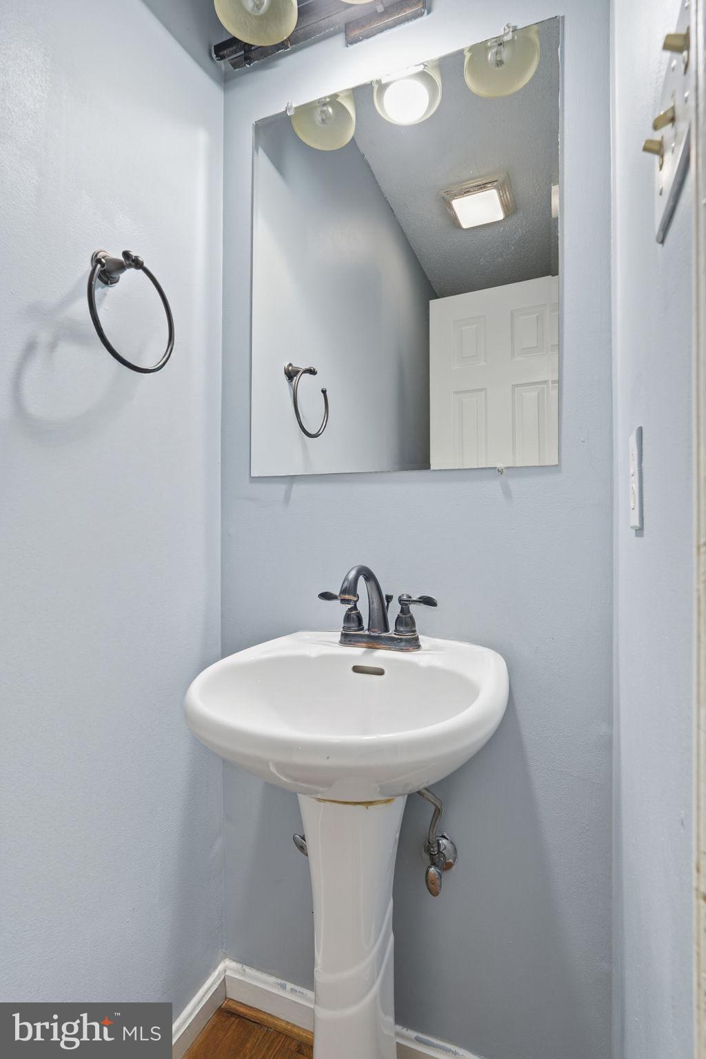 110 Rugby Place Winchester, VA 22603 - Photo 28 of 41 a bathroom with a sink mirror and toilet