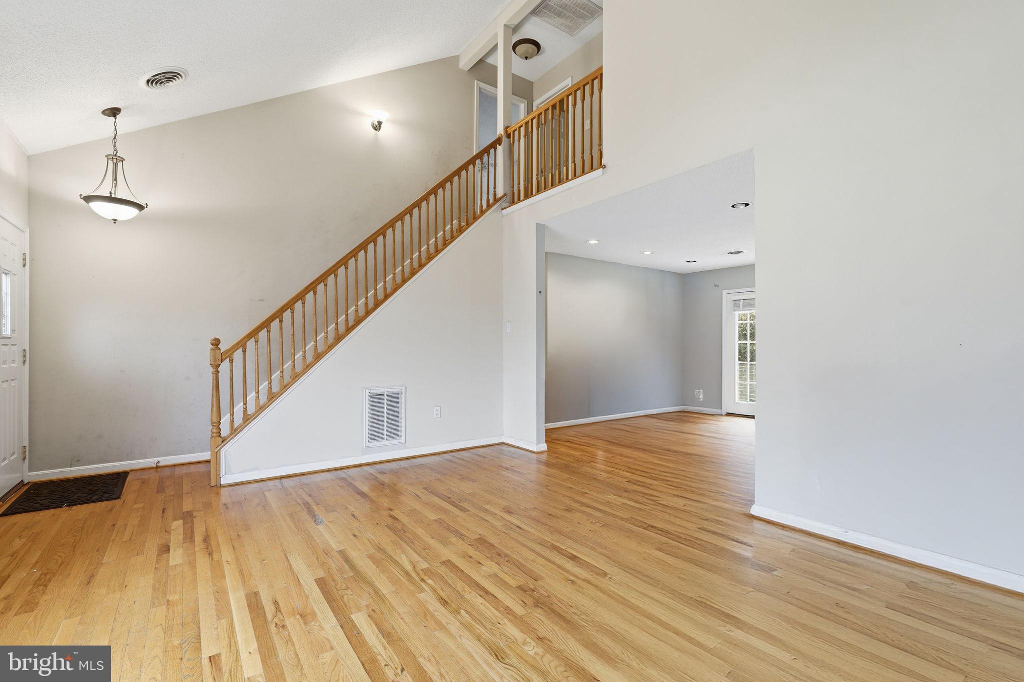 110 Rugby Place Winchester, VA 22603 - Photo 5 of 41 a view of an entryway with wooden floor
