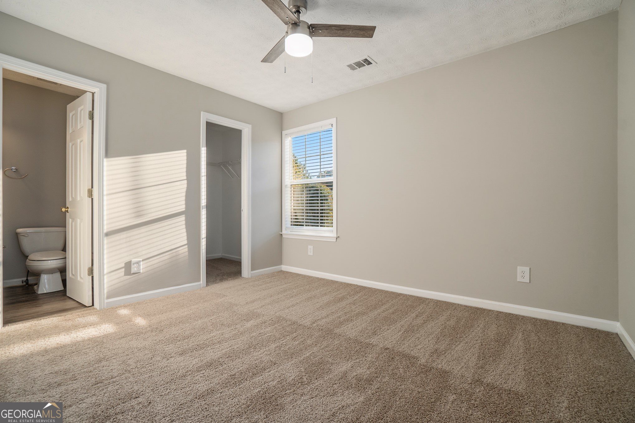 4395 Celebration Drive Southwest Atlanta, GA 30331 - Photo 19 of 25 a view of an empty room with a window