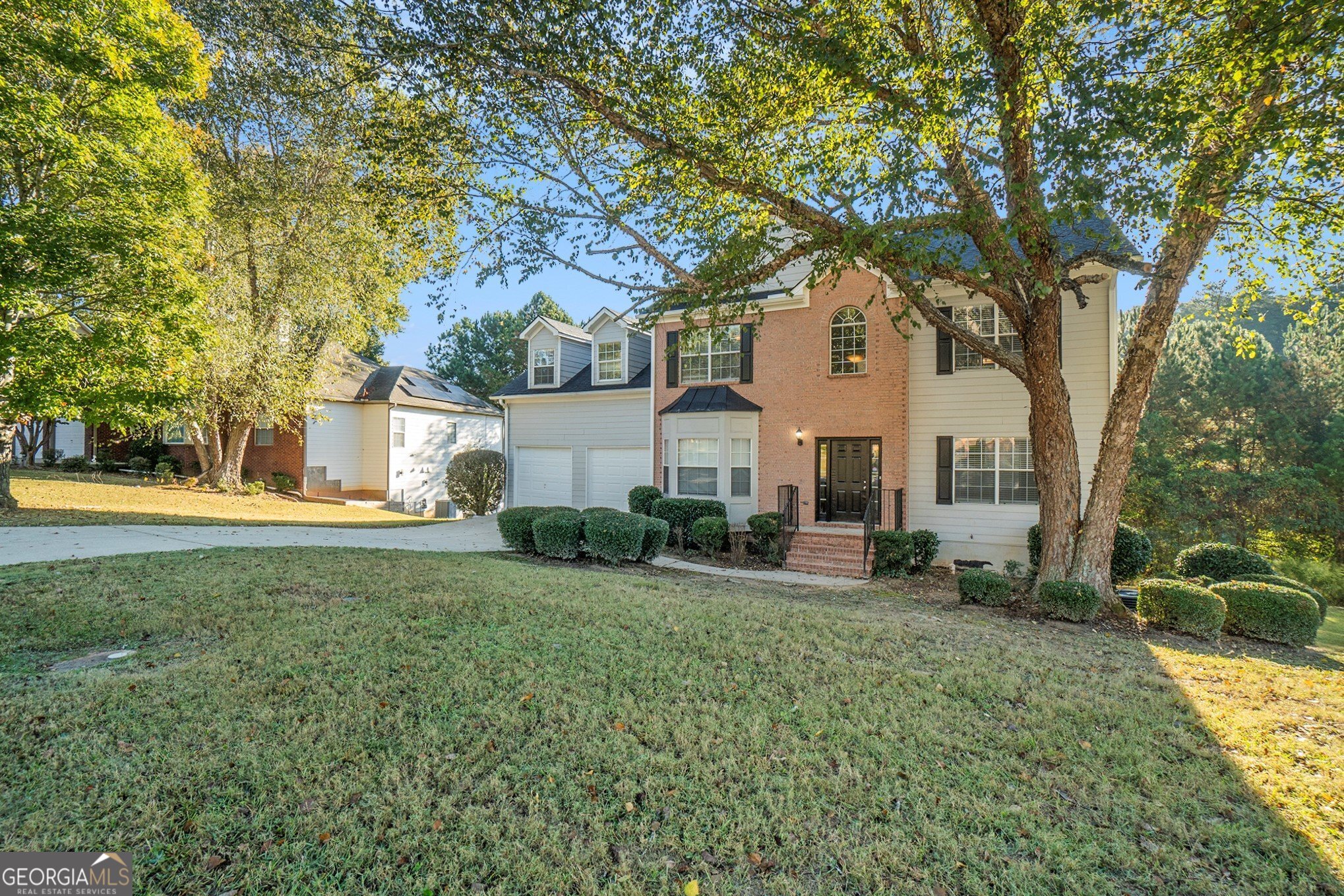 4395 Celebration Drive Southwest Atlanta, GA 30331 - Photo 2 of 25 a view of a house with backyard and sitting area