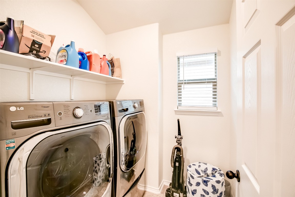 1924 Stringer Pass Leander, TX 78641 - Photo 29 of 34 a utility room with dryer and washer
