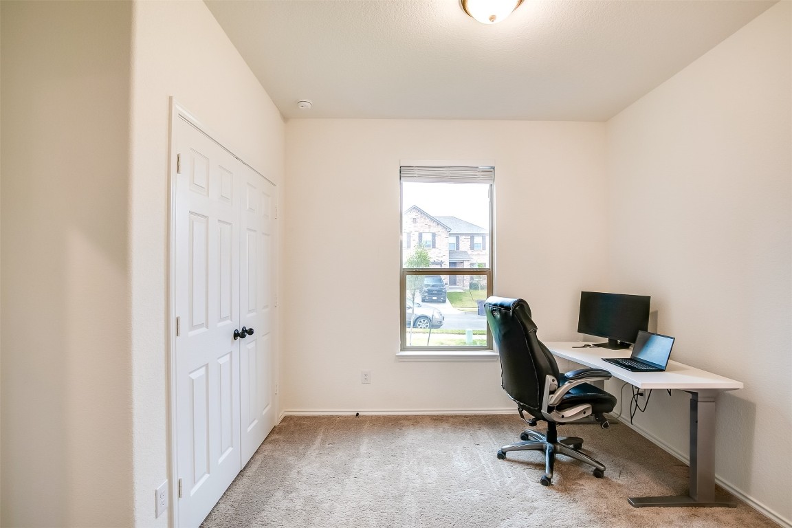 1924 Stringer Pass Leander, TX 78641 - Photo 5 of 34 a view of a workspace with a window