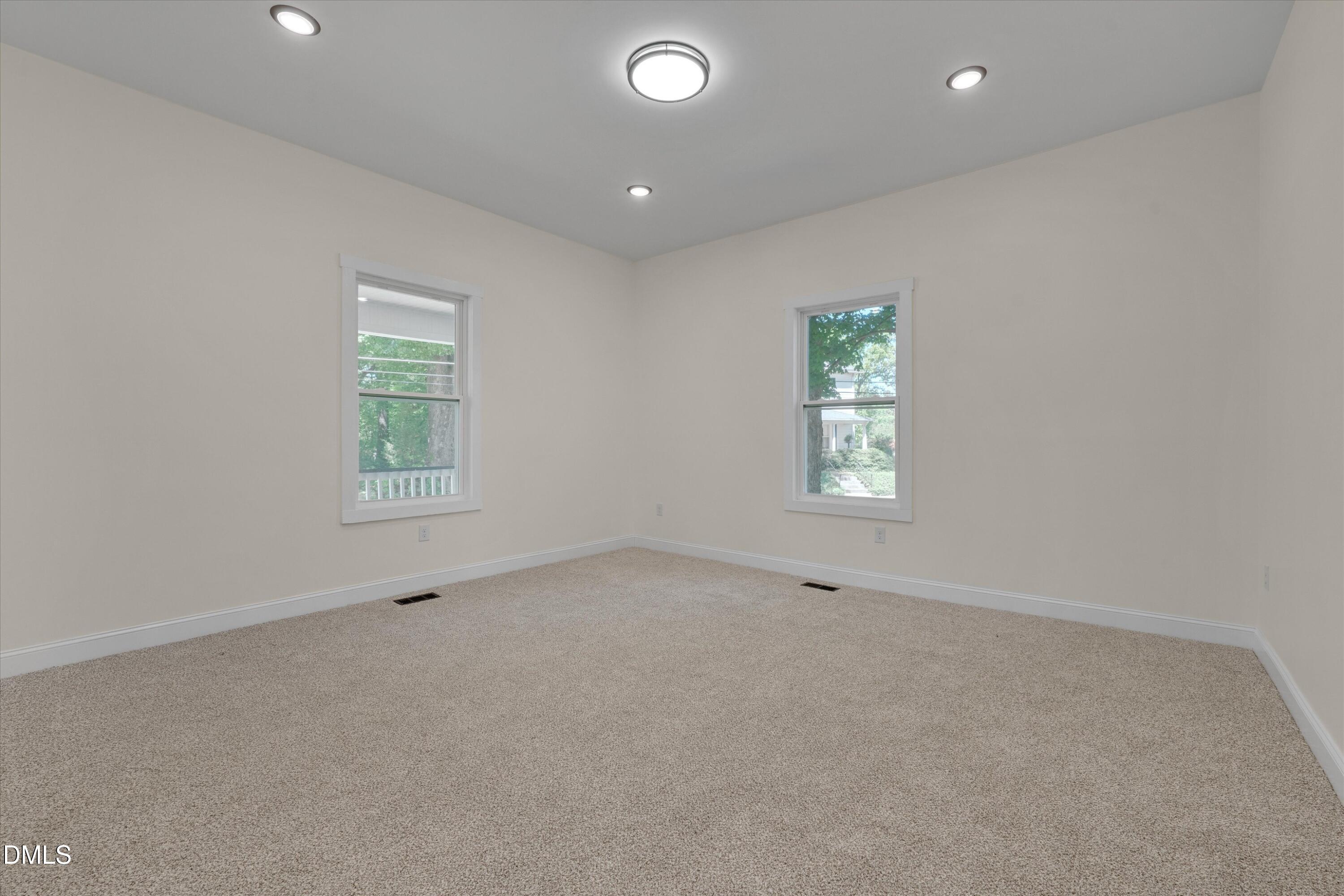 111 Virginia Avenue Roxboro, NC 27573 - Photo 10 of 42 an empty room with a window