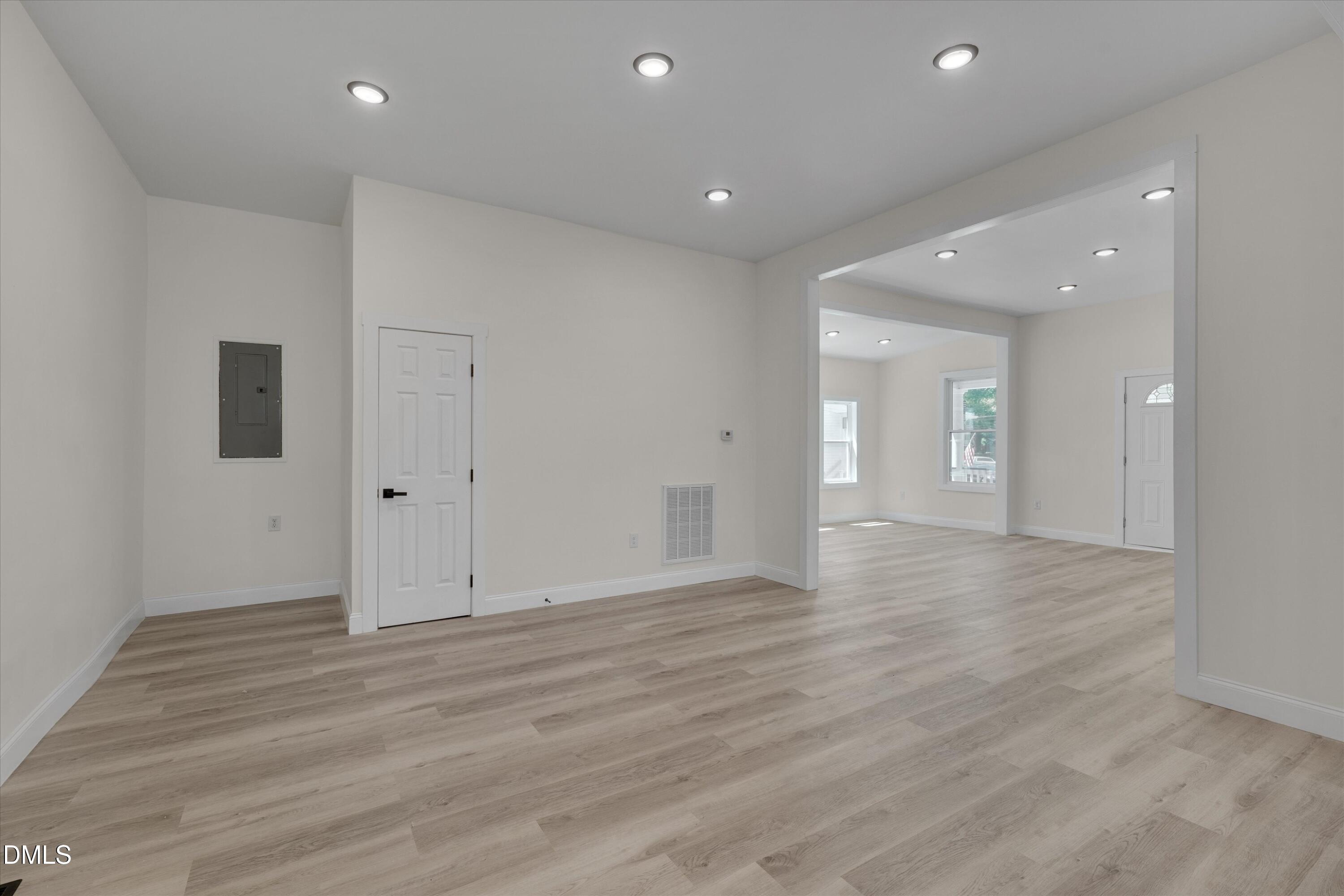 111 Virginia Avenue Roxboro, NC 27573 - Photo 14 of 42 a view of an empty room with wooden floor