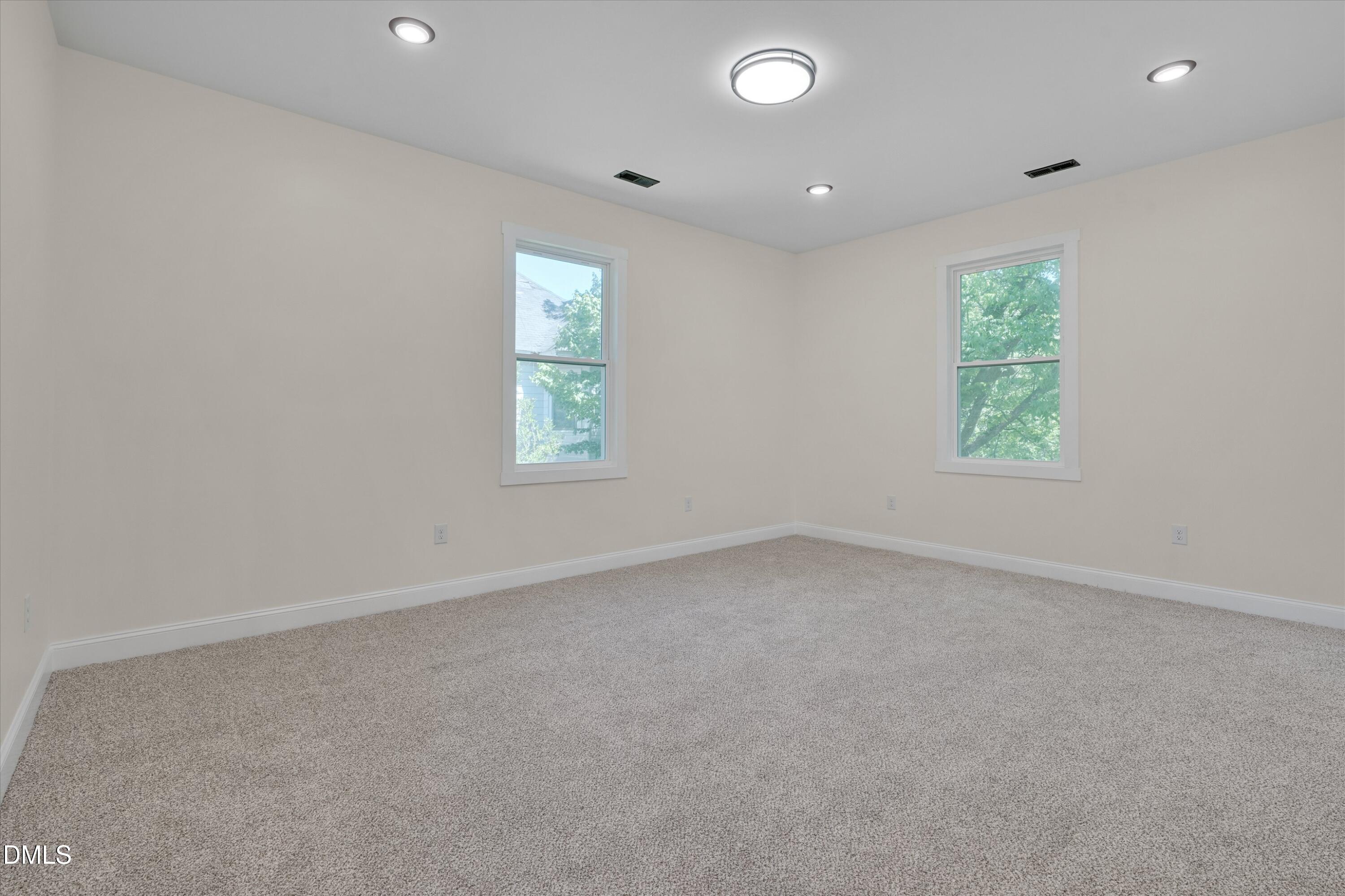 111 Virginia Avenue Roxboro, NC 27573 - Photo 26 of 42 an empty room with windows
