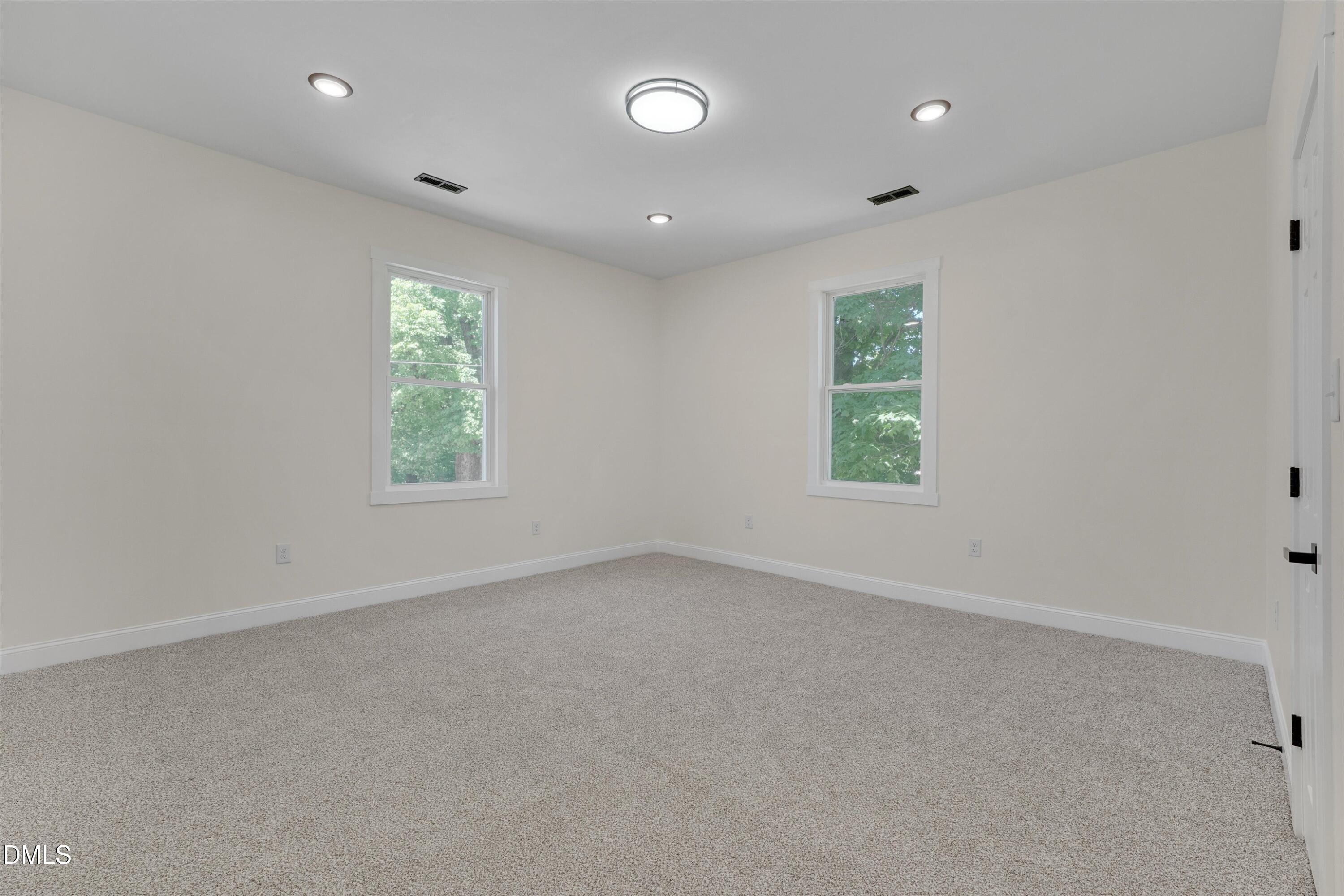 111 Virginia Avenue Roxboro, NC 27573 - Photo 32 of 42 an empty room with a window