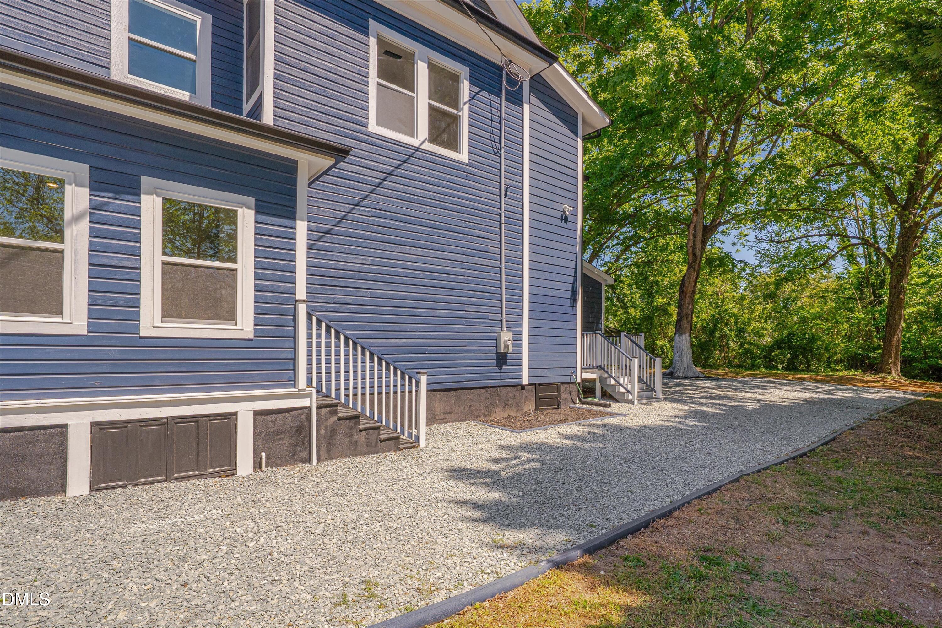 111 Virginia Avenue Roxboro, NC 27573 - Photo 36 of 42 a backyard of a house with seating space