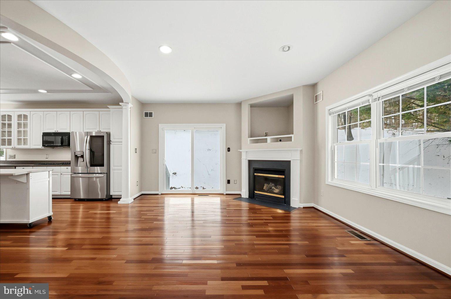 109 Waterside Lane Cross Junction, VA 22625 - Photo 18 of 107 a view of a livingroom with a fireplace wooden floor and windows