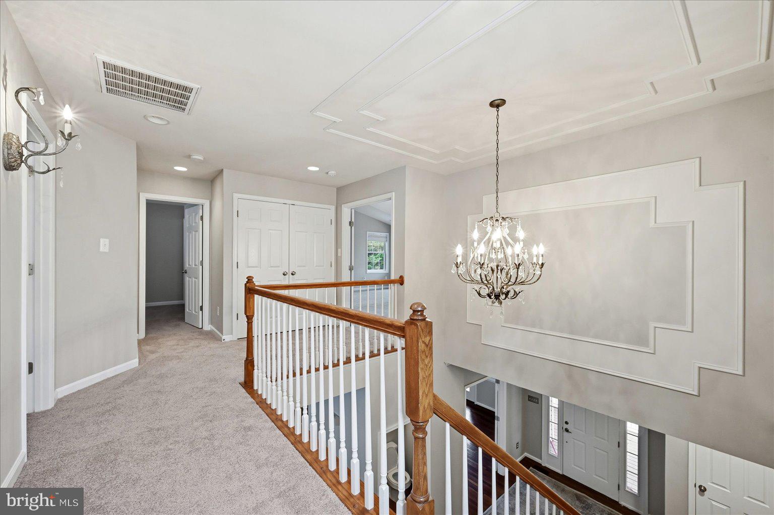 109 Waterside Lane Cross Junction, VA 22625 - Photo 29 of 107 a view of a hallway with chandelier