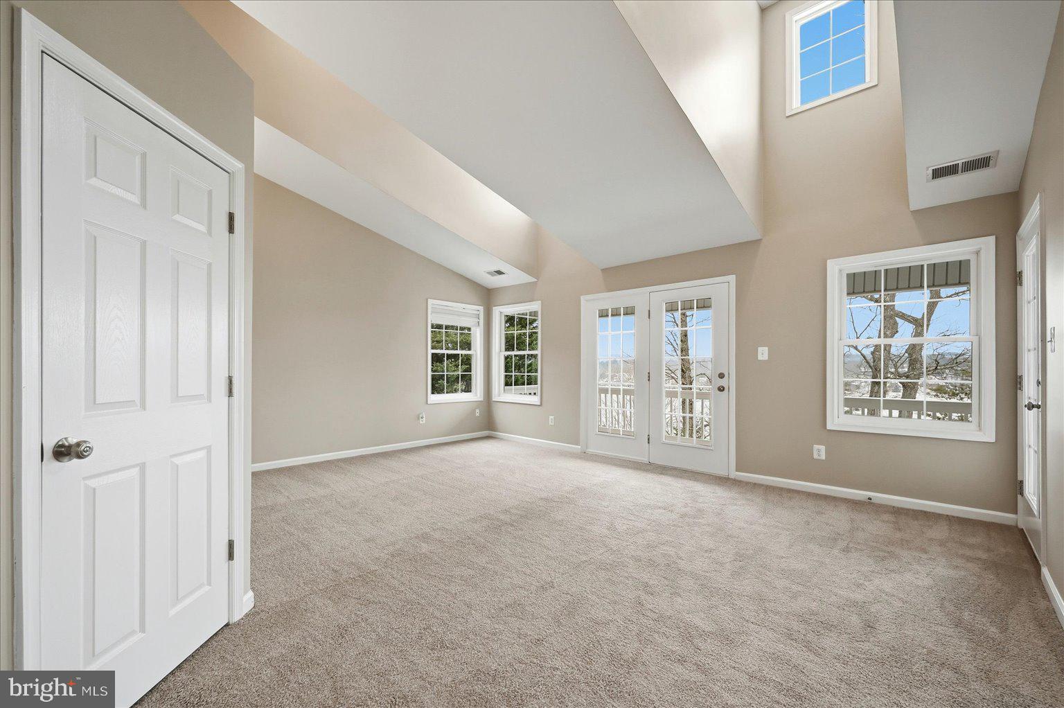 109 Waterside Lane Cross Junction, VA 22625 - Photo 32 of 107 a view of an empty room with a window