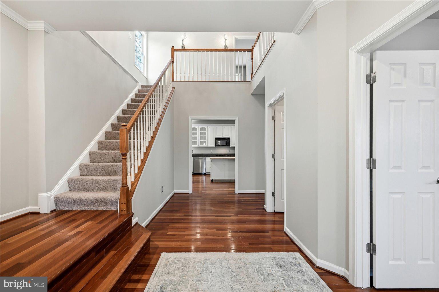 109 Waterside Lane Cross Junction, VA 22625 - Photo 4 of 107 a view of a hallway with wooden floor and entryway