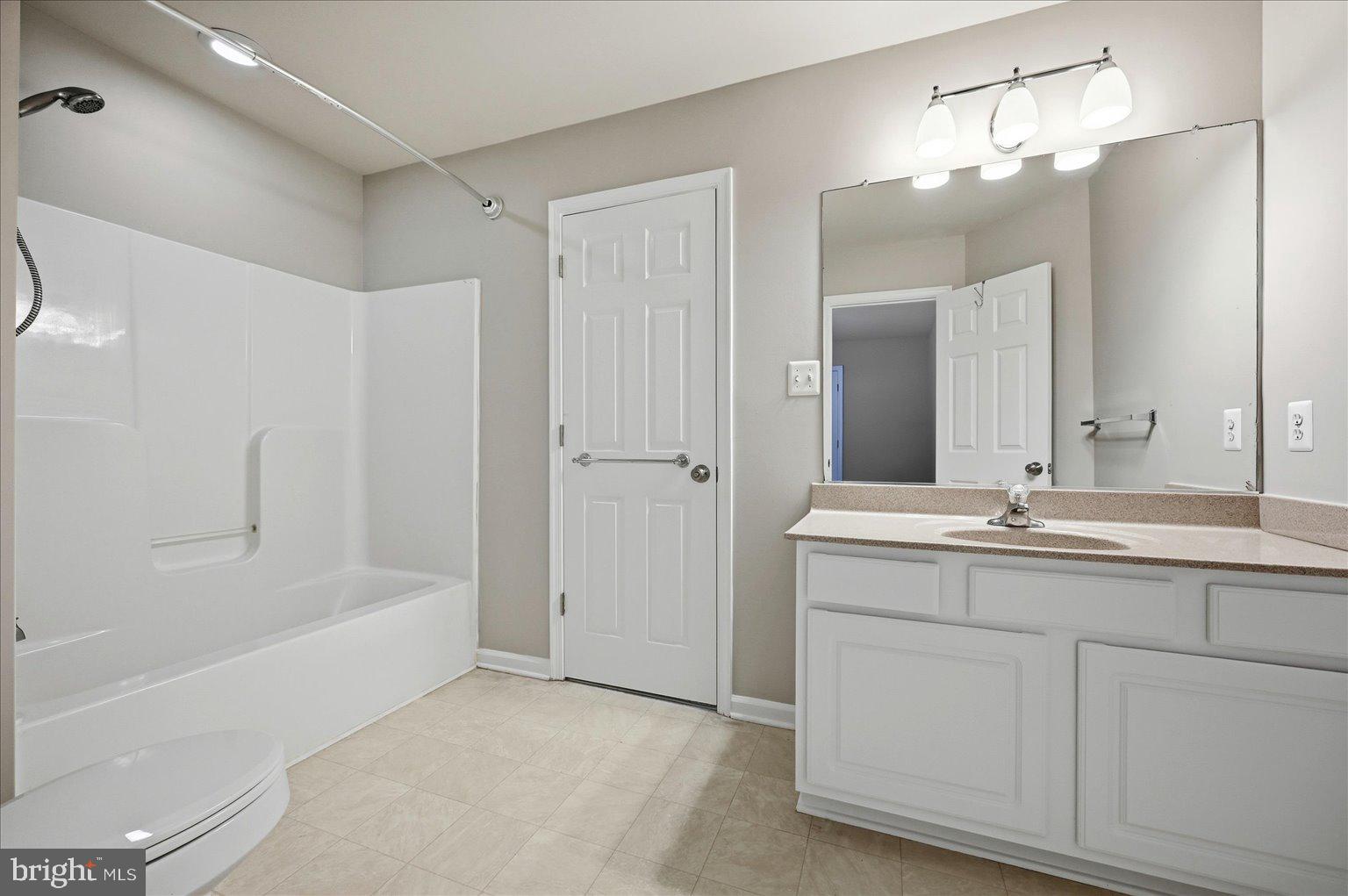 109 Waterside Lane Cross Junction, VA 22625 - Photo 45 of 107 a bathroom with a tub a sink and mirror