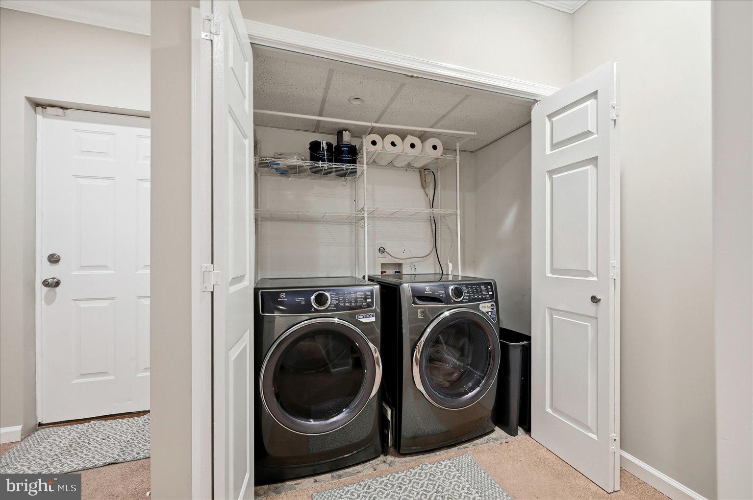 109 Waterside Lane Cross Junction, VA 22625 - Photo 50 of 107 a view of a hallway with washer and dryer
