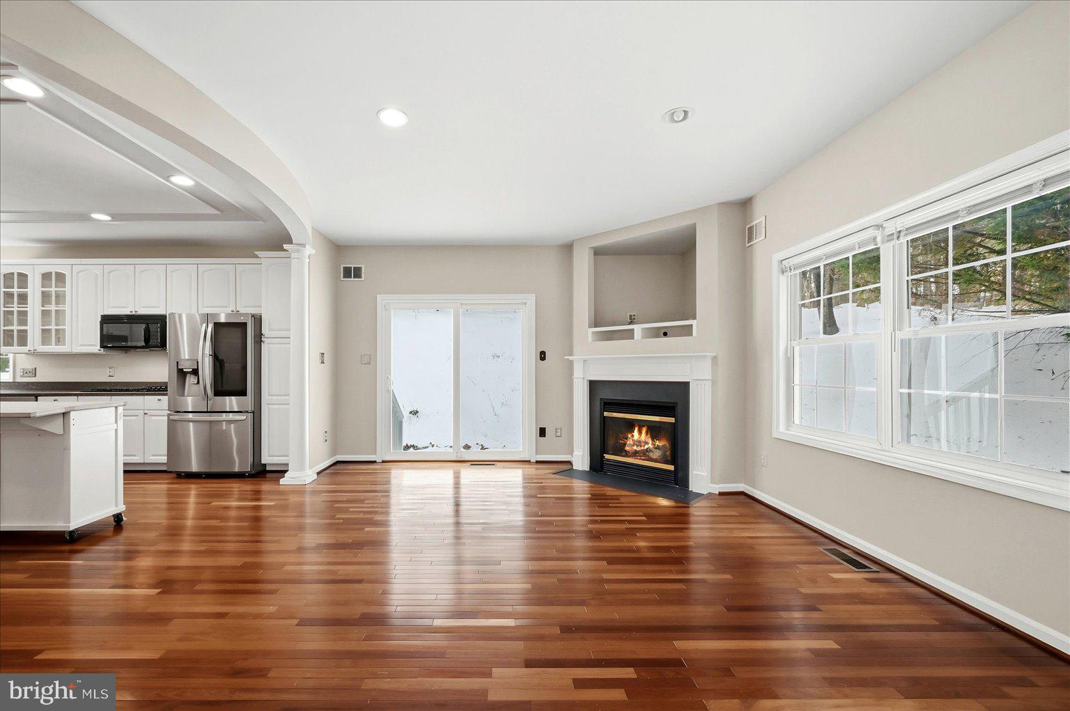109 Waterside Lane Cross Junction, VA 22625 - Photo 10 of 107 Living room with fireplace and doors to rear yard