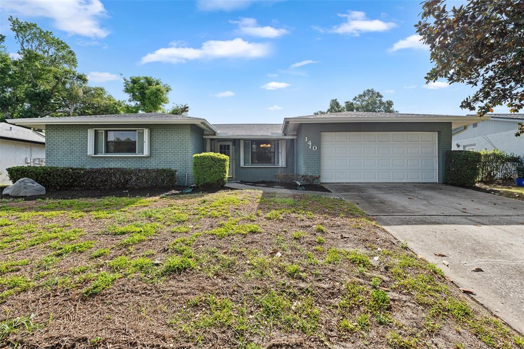 140 Valley Circle Brandon, FL 33510 - Photo 2 of 48 a front view of a house with a yard