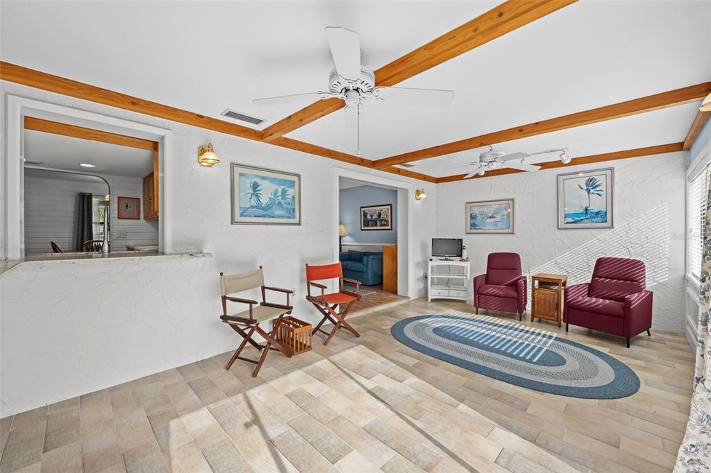 140 Valley Circle Brandon, FL 33510 - Photo 23 of 48 a living room with furniture and wooden floor