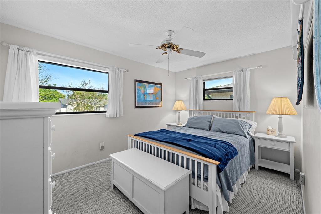 140 Valley Circle Brandon, FL 33510 - Photo 26 of 48 a bedroom with a bed and a window