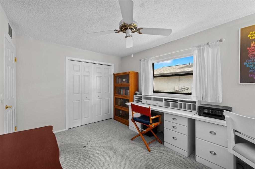140 Valley Circle Brandon, FL 33510 - Photo 29 of 48 a view of a bedroom with furniture and windows