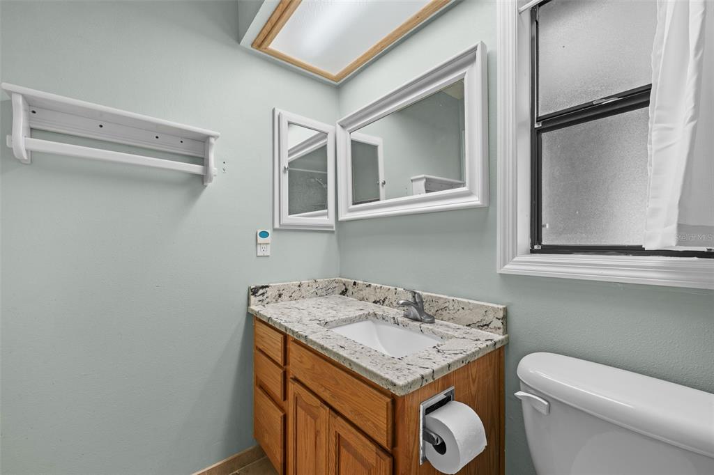 140 Valley Circle Brandon, FL 33510 - Photo 31 of 48 a utility room with a sink a washer and dryer
