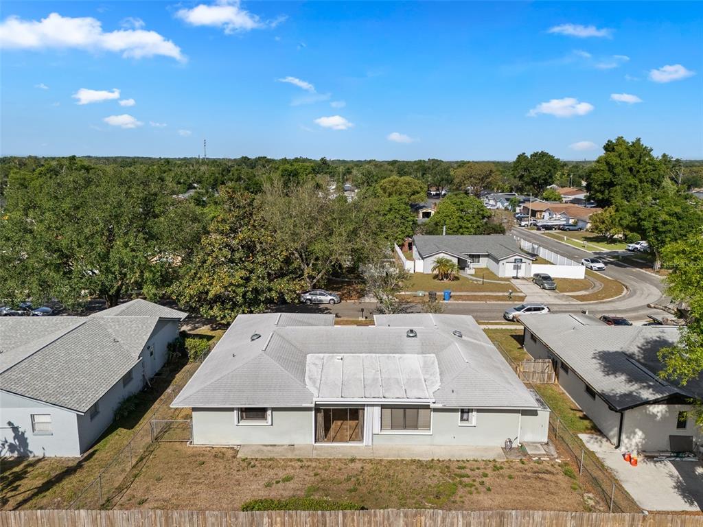 140 Valley Circle Brandon, FL 33510 - Photo 43 of 48 an aerial view of a house with a yard