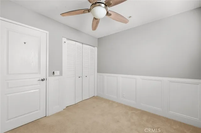 a view of empty room with windows