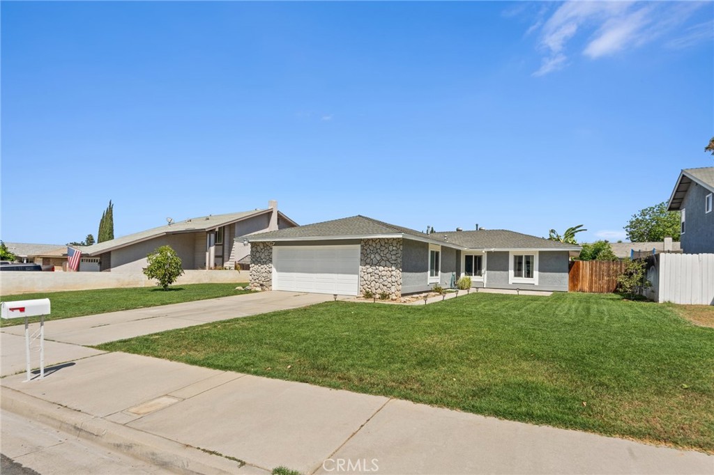 3573 Ellery Drive Riverside, CA 92503 - Photo 1 of 1 a front view of a house with a yard and porch