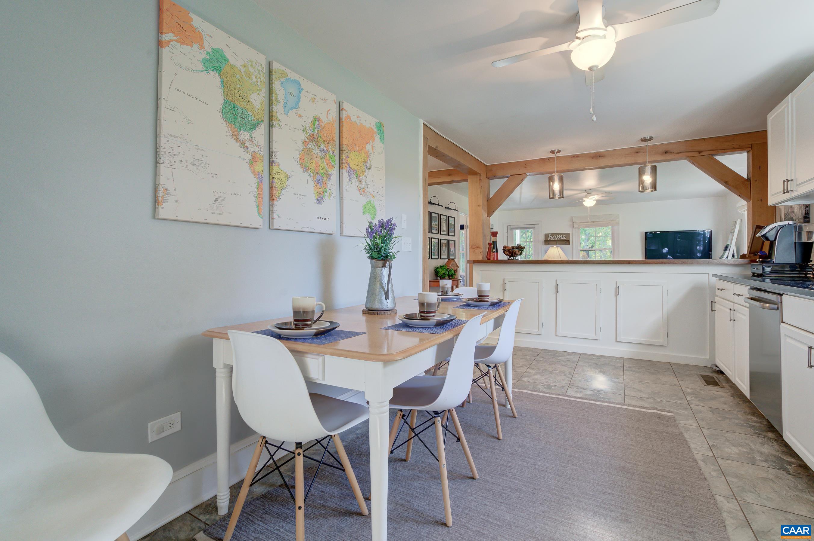 2974 Milton Road Charlottesville, VA 22902 - Photo 16 of 50 a view of a dining room with furniture and a kitchen view