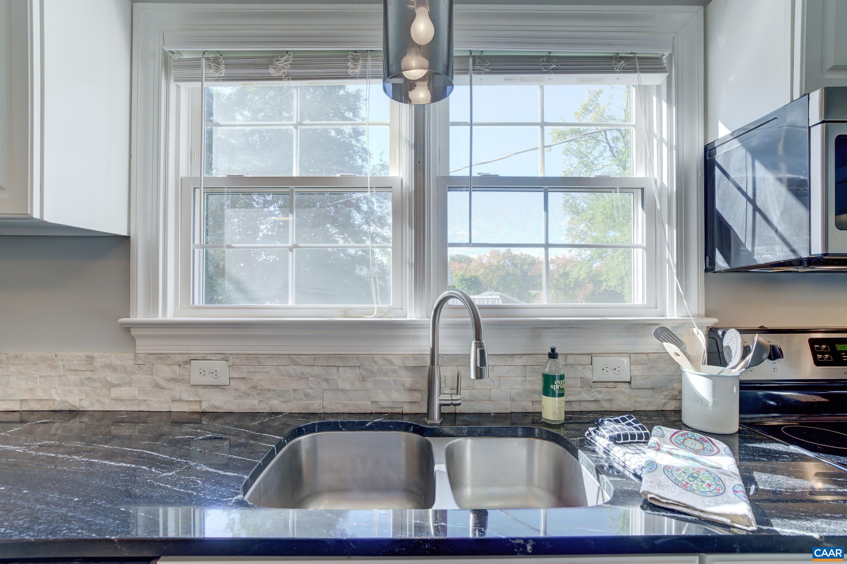 2974 Milton Road Charlottesville, VA 22902 - Photo 19 of 50 a kitchen with a sink cabinets and window
