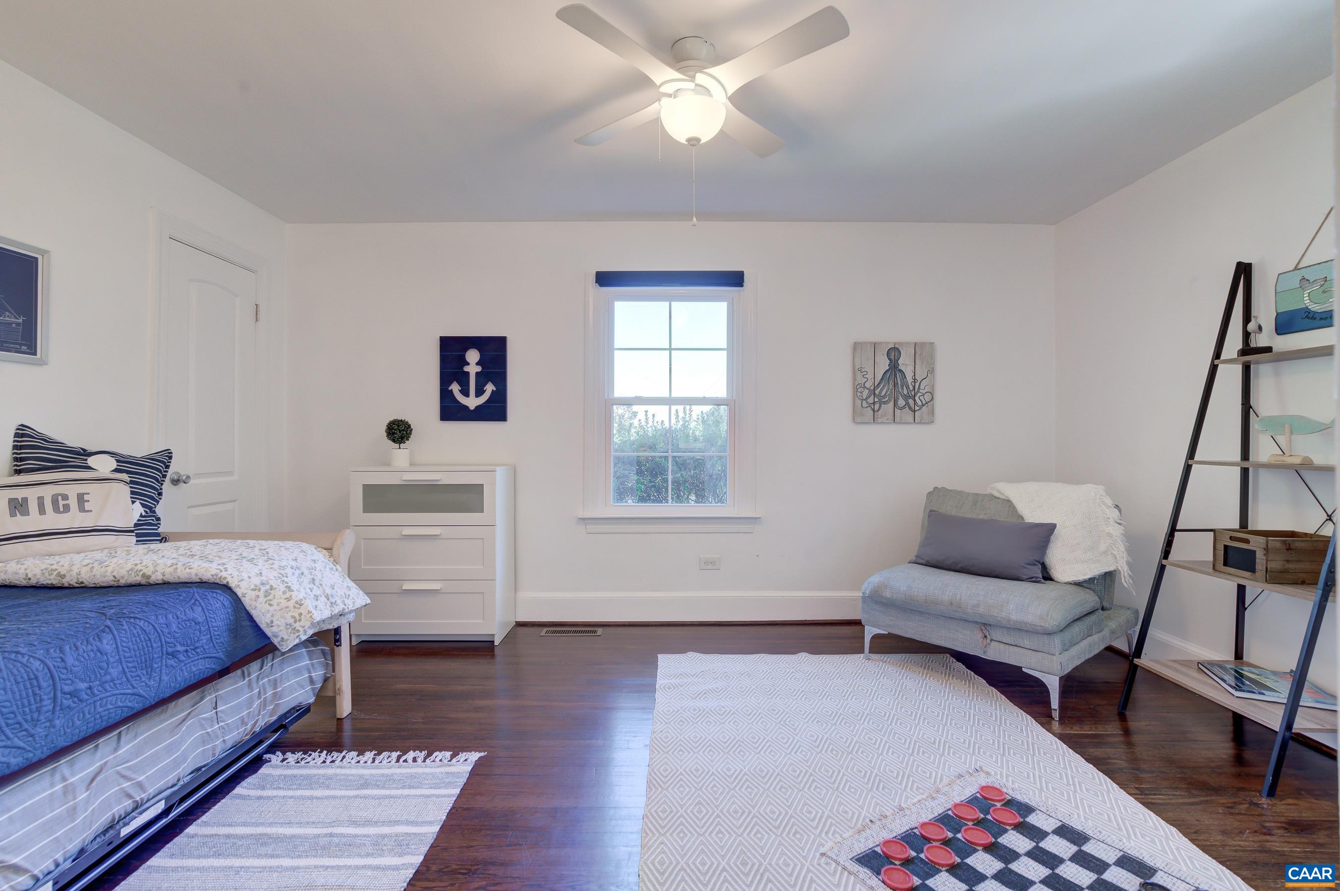 2974 Milton Road Charlottesville, VA 22902 - Photo 23 of 50 a bedroom with a bed and a couch