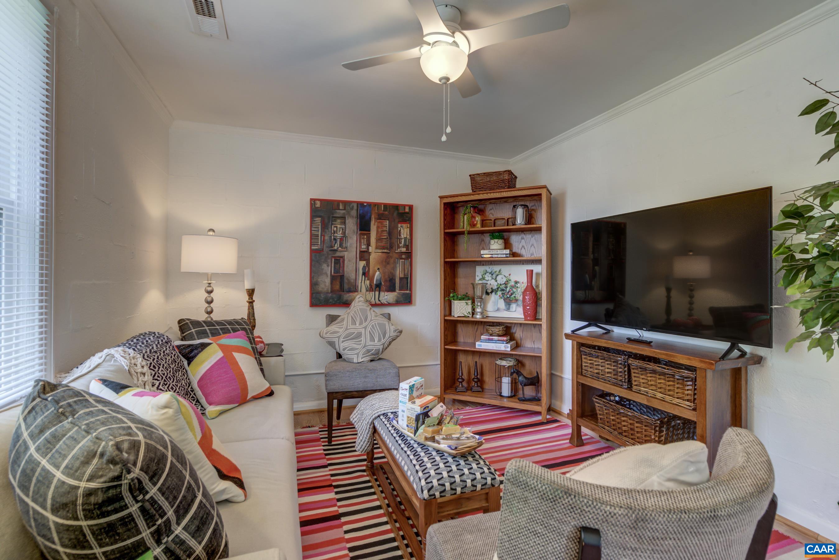 2974 Milton Road Charlottesville, VA 22902 - Photo 30 of 50 a living room with furniture and a flat screen tv