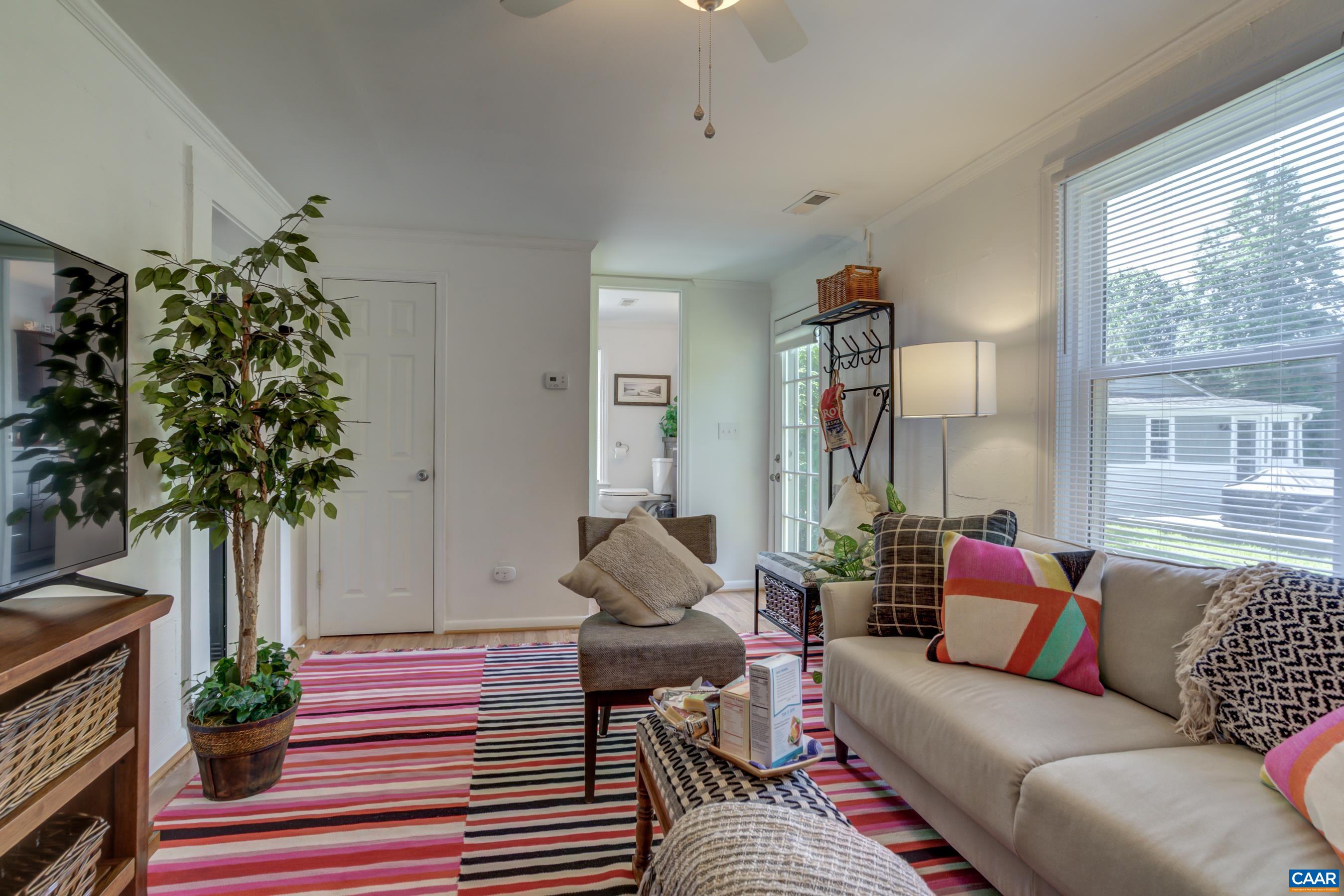 2974 Milton Road Charlottesville, VA 22902 - Photo 31 of 50 a living room with furniture and a potted plant