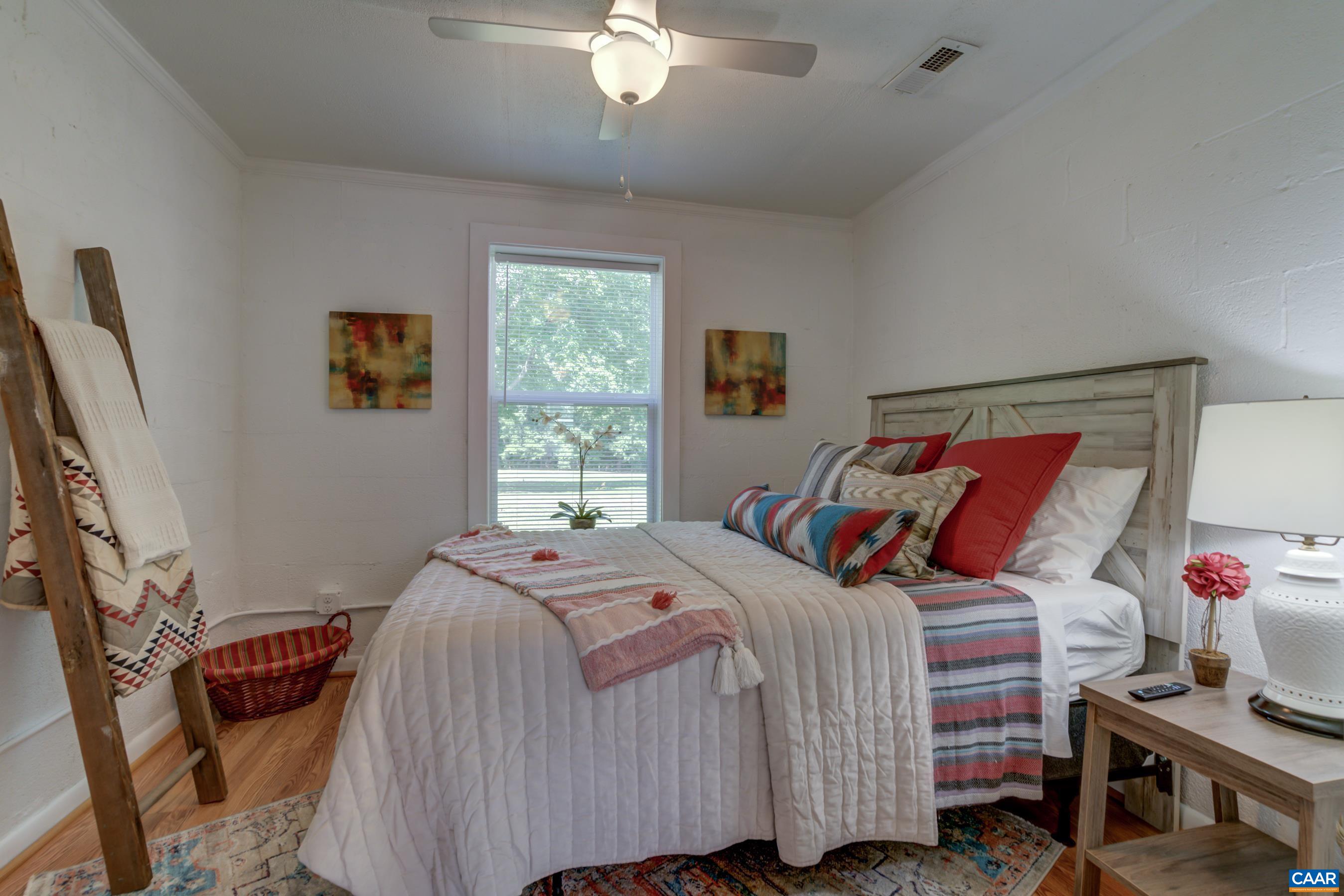 2974 Milton Road Charlottesville, VA 22902 - Photo 33 of 50 a bedroom with a bed and a window