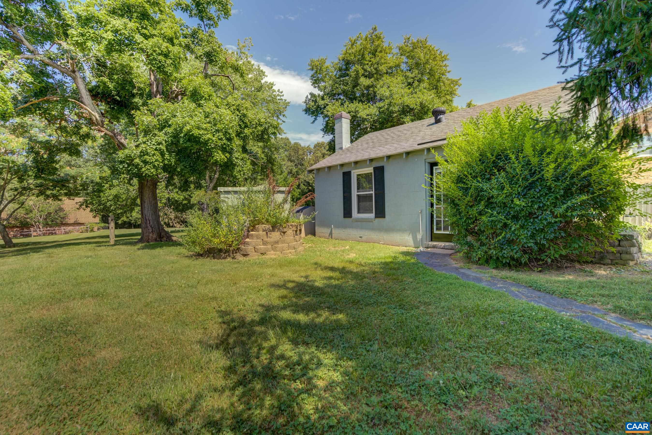 2974 Milton Road Charlottesville, VA 22902 - Photo 43 of 50 a view of a backyard with large trees