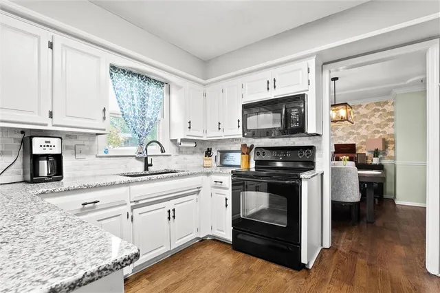 $425,000 | 8403 Swarner Drive, Lenexa, KS 66219