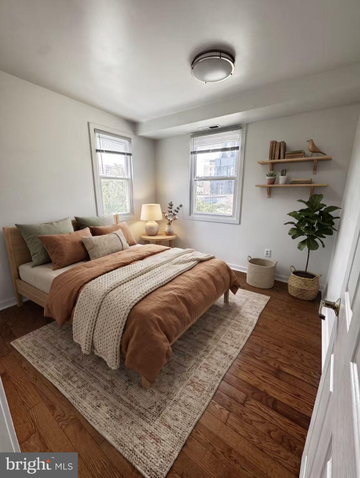 304 North 8th Street Philadelphia, PA 19123 - Photo 4 of 16 a bedroom with bed and window