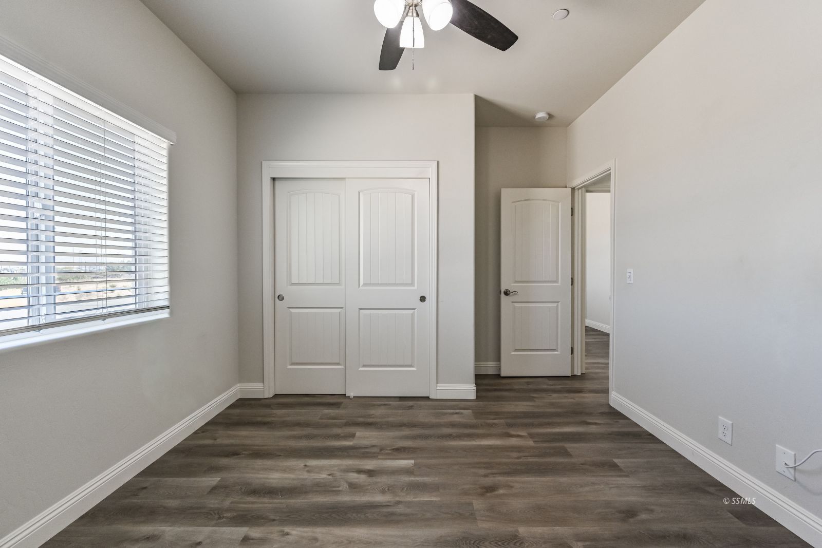 1031 West Church Avenue Ridgecrest, CA 93555 - Photo 41 of 49 a view of empty room with window and ceiling fan