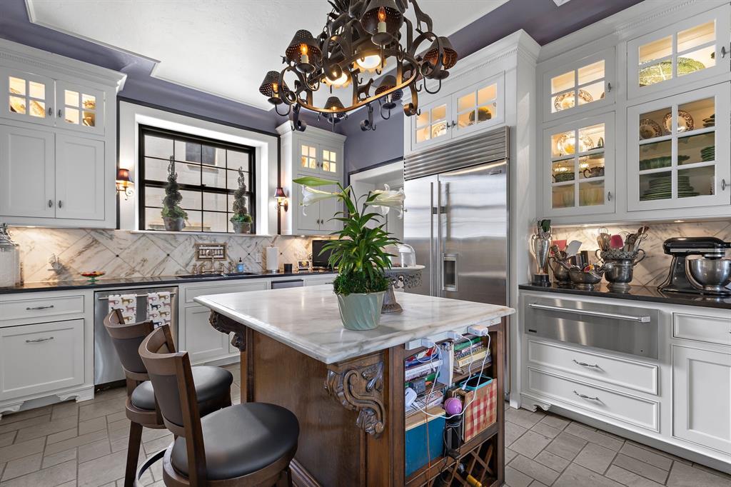 3100 Hamilton Boulevard Wichita Falls, TX 76308 - Photo 18 of 40 a kitchen with stainless steel appliances granite countertop a sink and cabinets