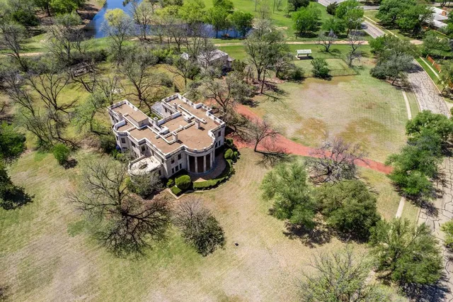 an aerial view of residential house with outdoor space
