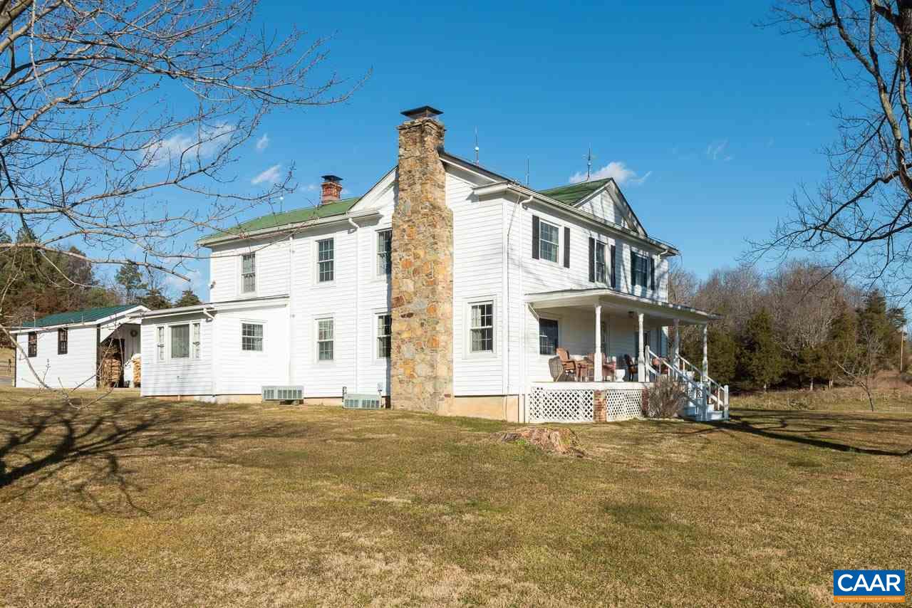 815 Foothills Road Stanardsville, VA 22973 - Photo 2 of 15 a front view of a house with a yard