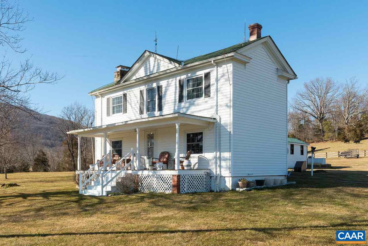 815 Foothills Road Stanardsville, VA 22973 - Photo 3 of 15 a front view of a house with swimming pool