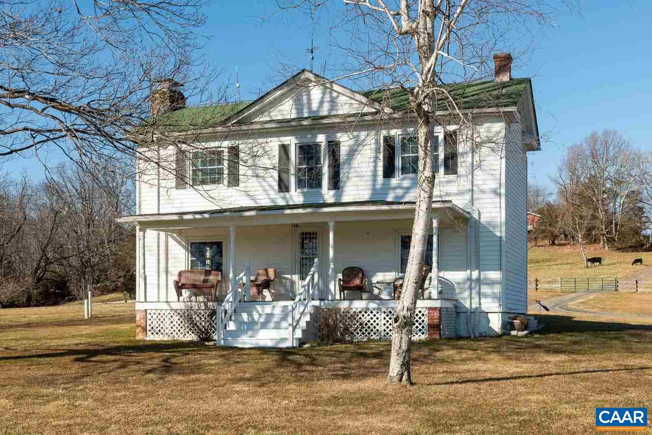 815 Foothills Road Stanardsville, VA 22973 - Photo 4 of 15 a front view of a house with a porch