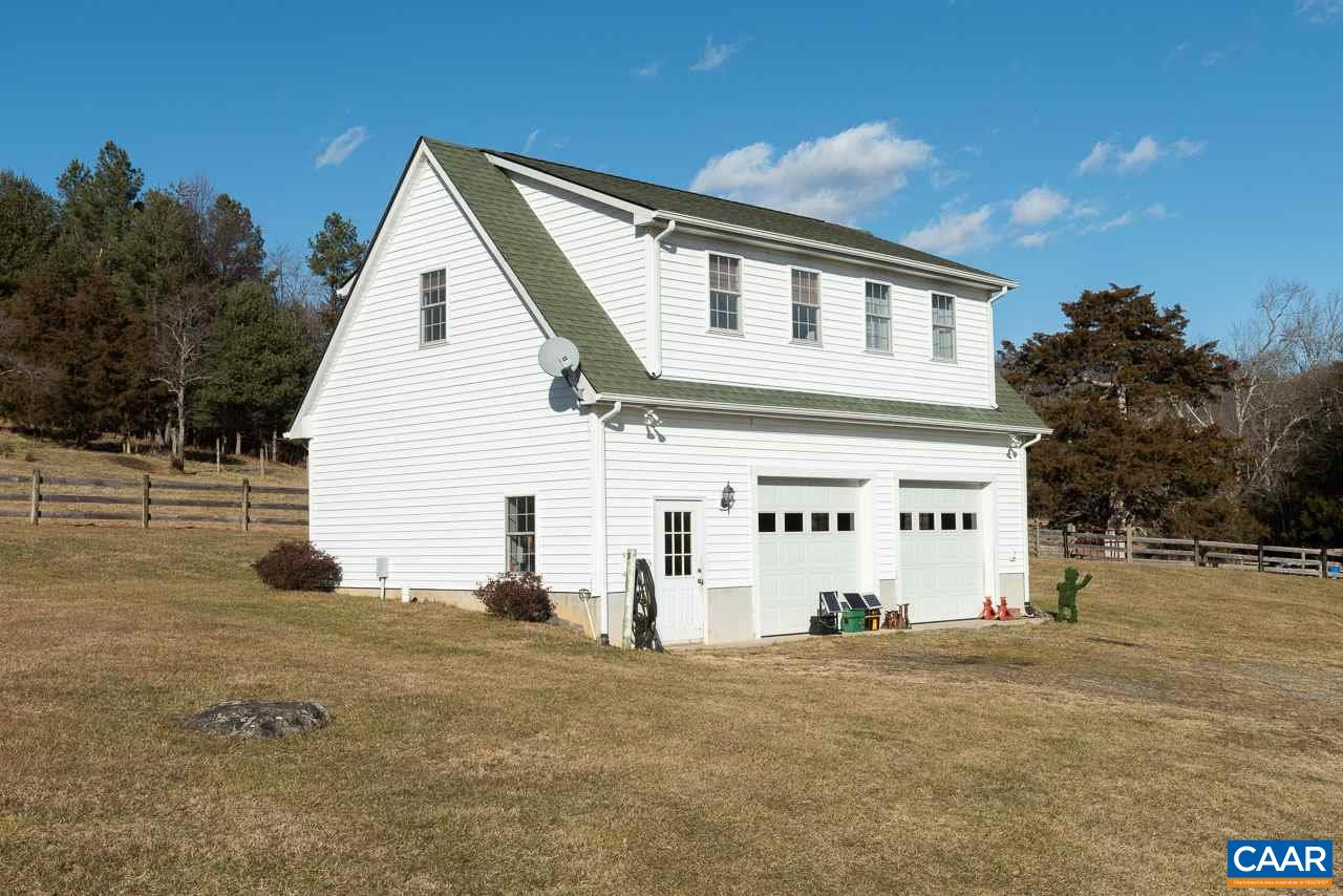 815 Foothills Road Stanardsville, VA 22973 - Photo 9 of 15 a view of a white house with a yard