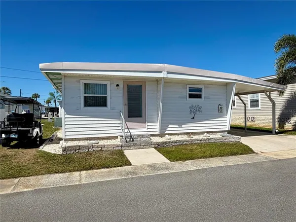a front view of a house with a garage