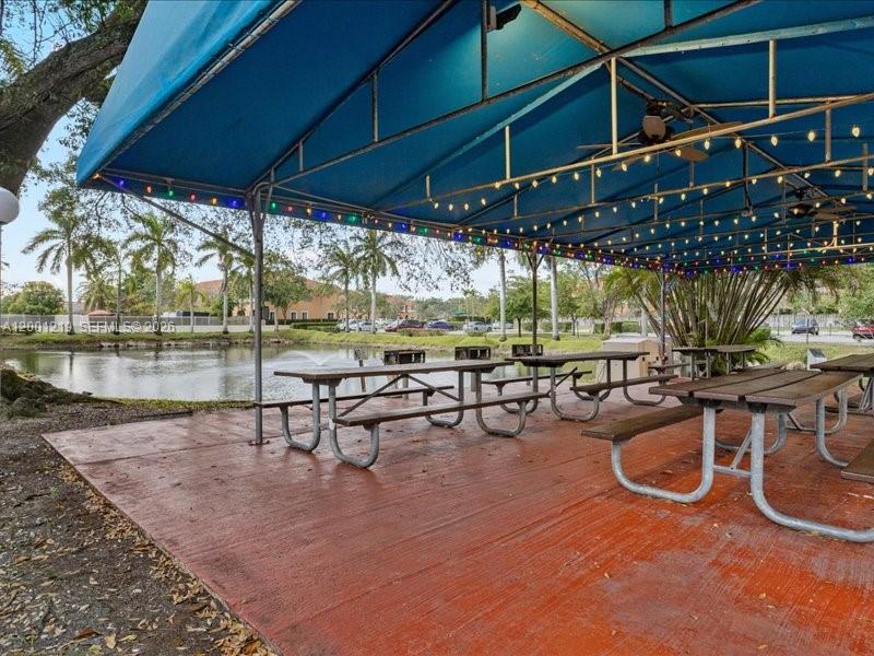 6193 Rock Island Road, Unit 105 Tamarac, FL 33319 - Photo 24 of 24 an outdoor space with seating