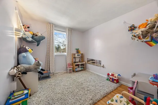 a room with furniture and a gym equipment