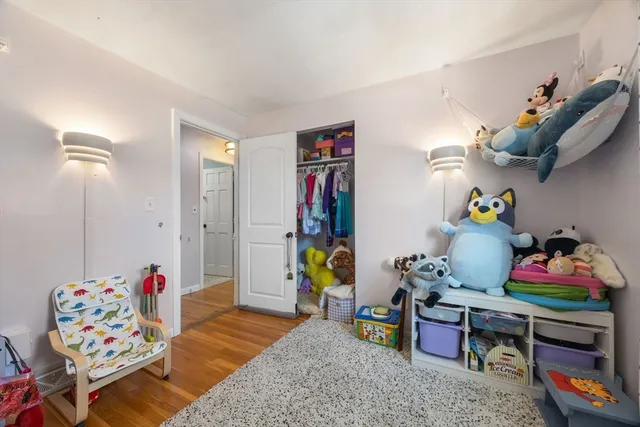 a living room filled with furniture and toys