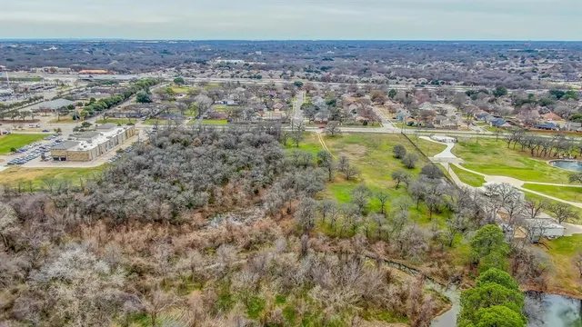 an aerial view of residential building and outdoor space