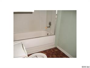 2537 Hillian-Edwards Road Cheraw, SC 29520 - Photo 5 of 13 a bathroom with a sink a bath tub and a shower