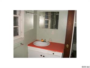 2537 Hillian-Edwards Road Cheraw, SC 29520 - Photo 6 of 13 a bathroom with a sink mirror and vanity